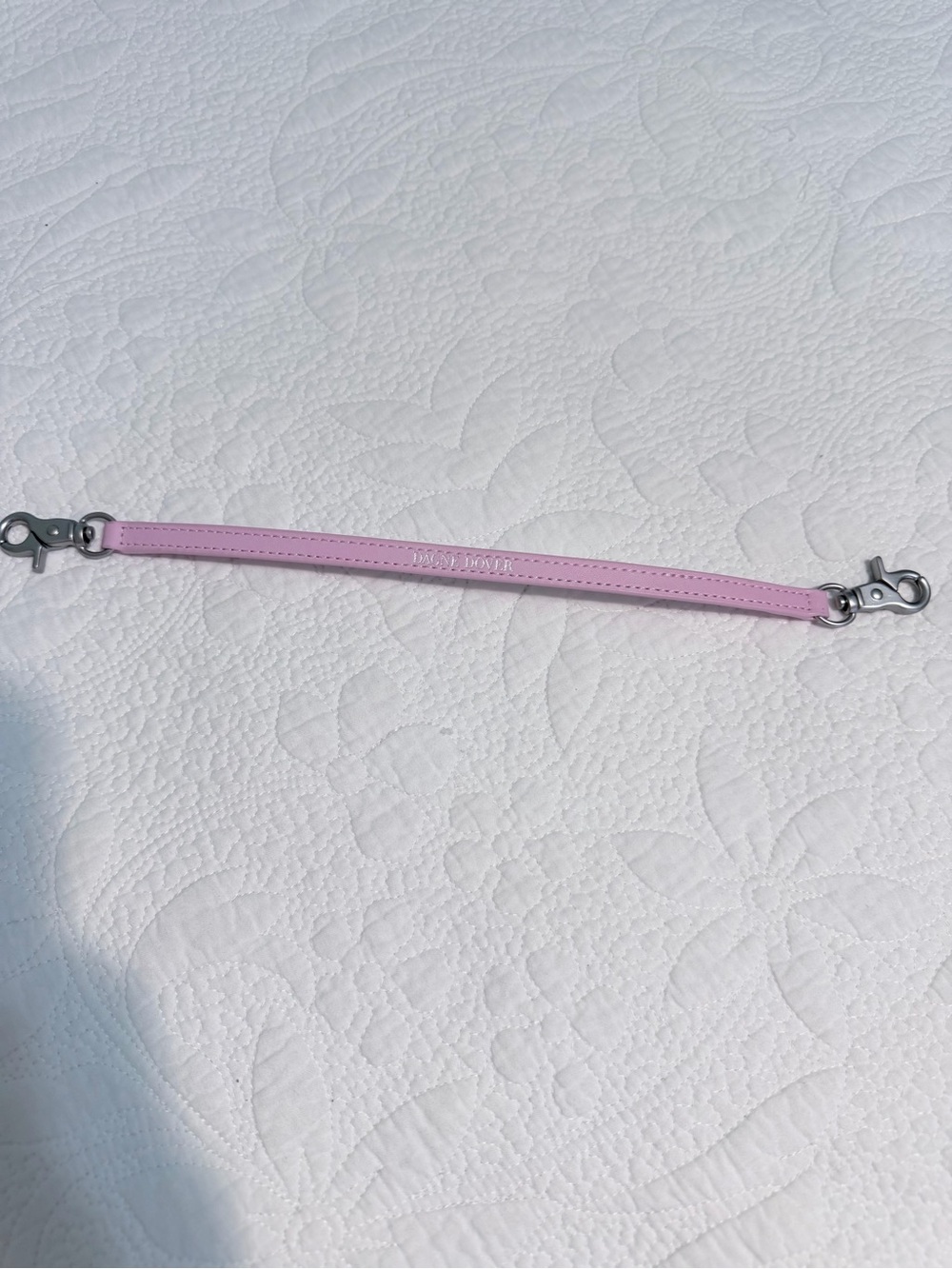 Dange Dover pink wristlet strap with silver hardware clasps